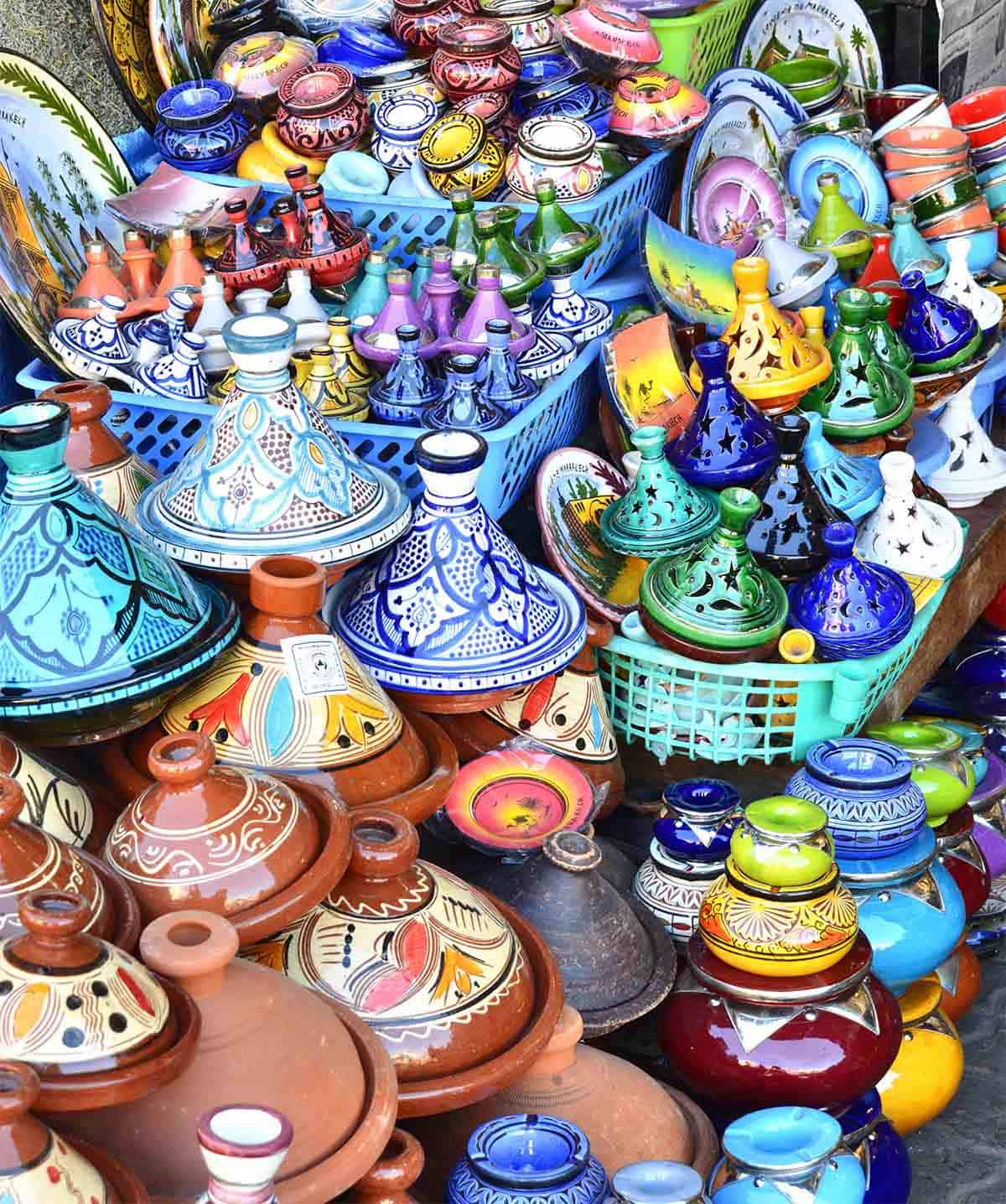 Colorful handcrafted Moroccan tagines at a market in Marrakesh