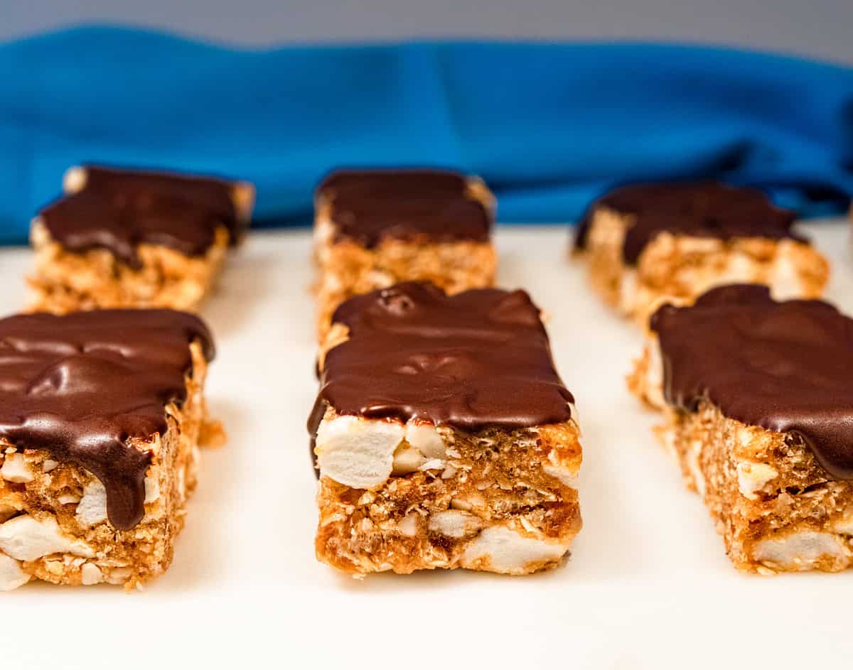 Peanut Butter S'mores bars on a white board.