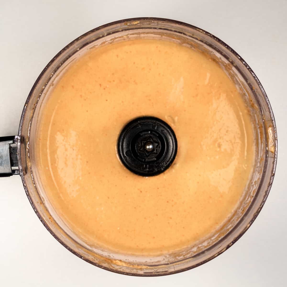 Just make peanut sauce in a food processor.