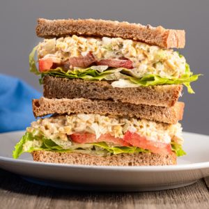 Chickpea tuna salad sandwich stacked.