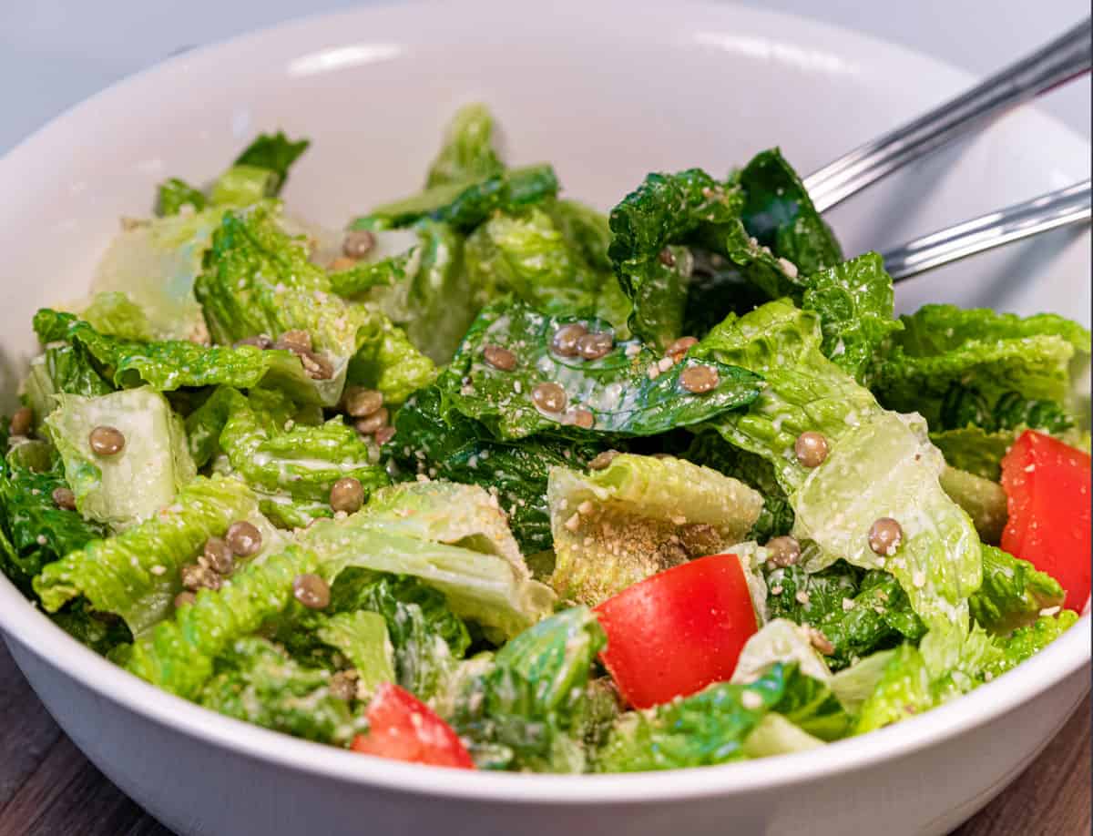 A bowl of vegan caesar salad.