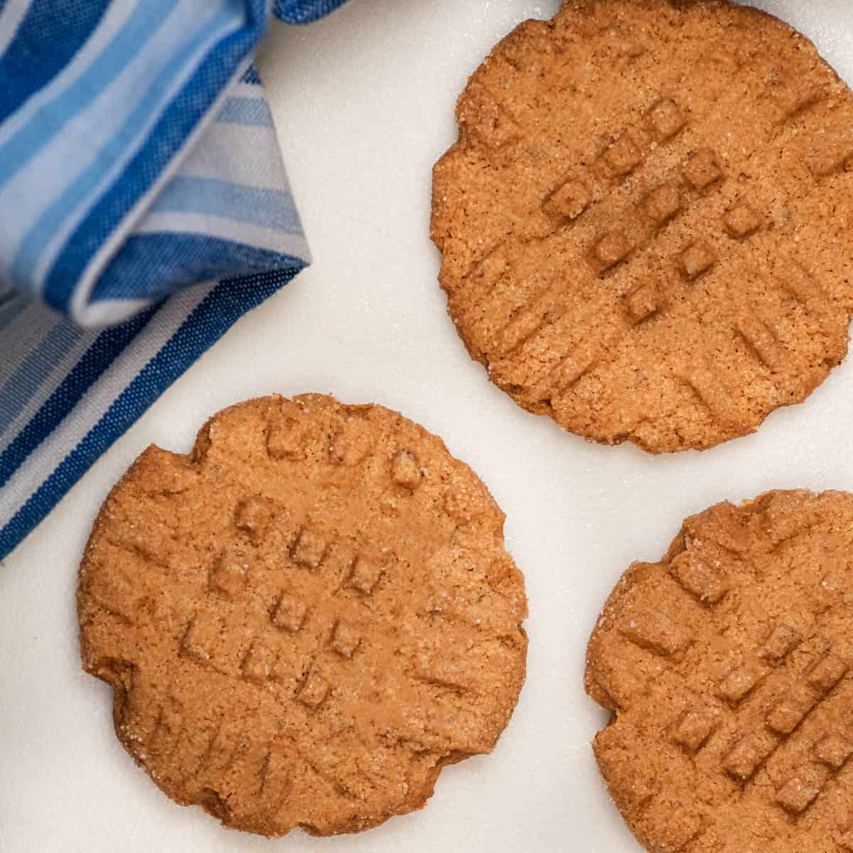 Vegan peanut butter cookies on a cutting board.