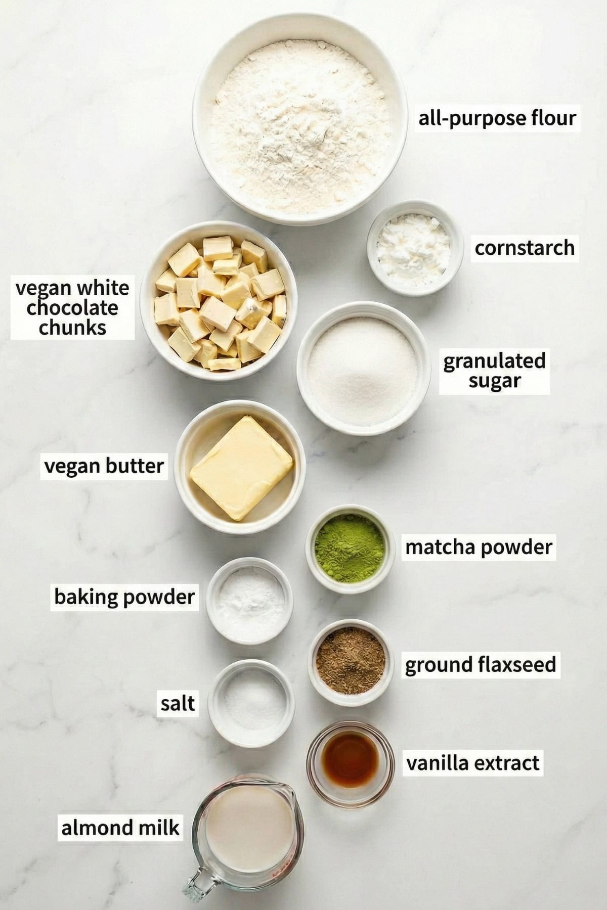 collection of matcha cookie ingredients in small bowls