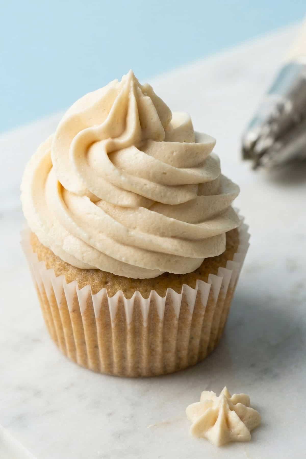 Vegan vanilla buttercream on a cupcake.
