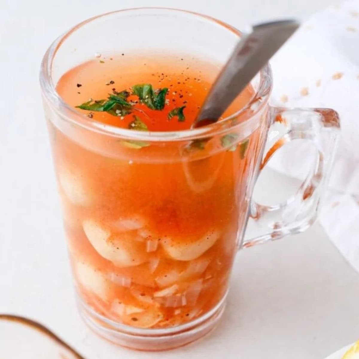 A glass cup of halabessa soup.